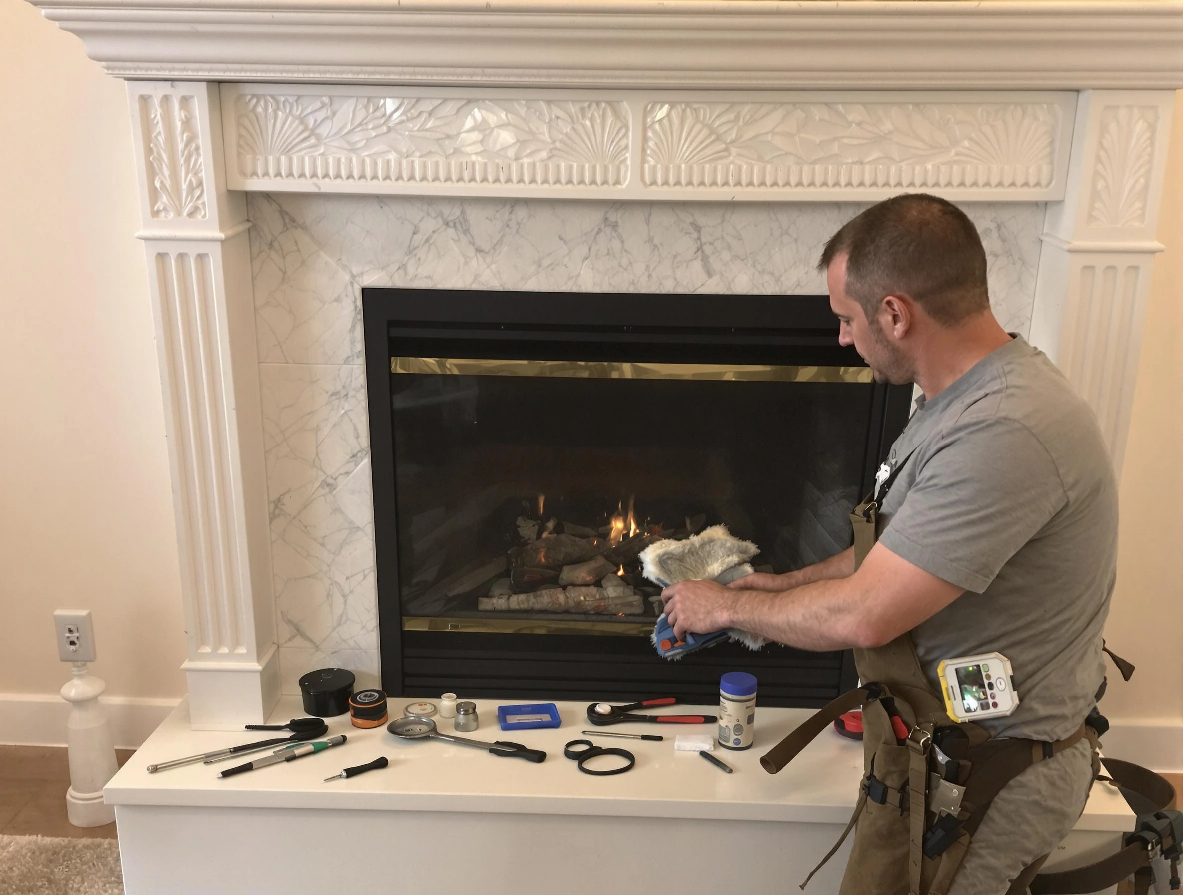 Union City Chimney Sweep performing fireplace maintenance in Union City, GA